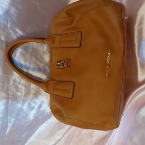 Christian Siriano cognac handbag